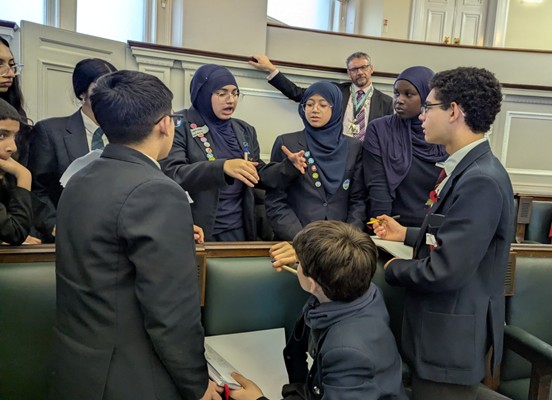 Picture of students debating during the event